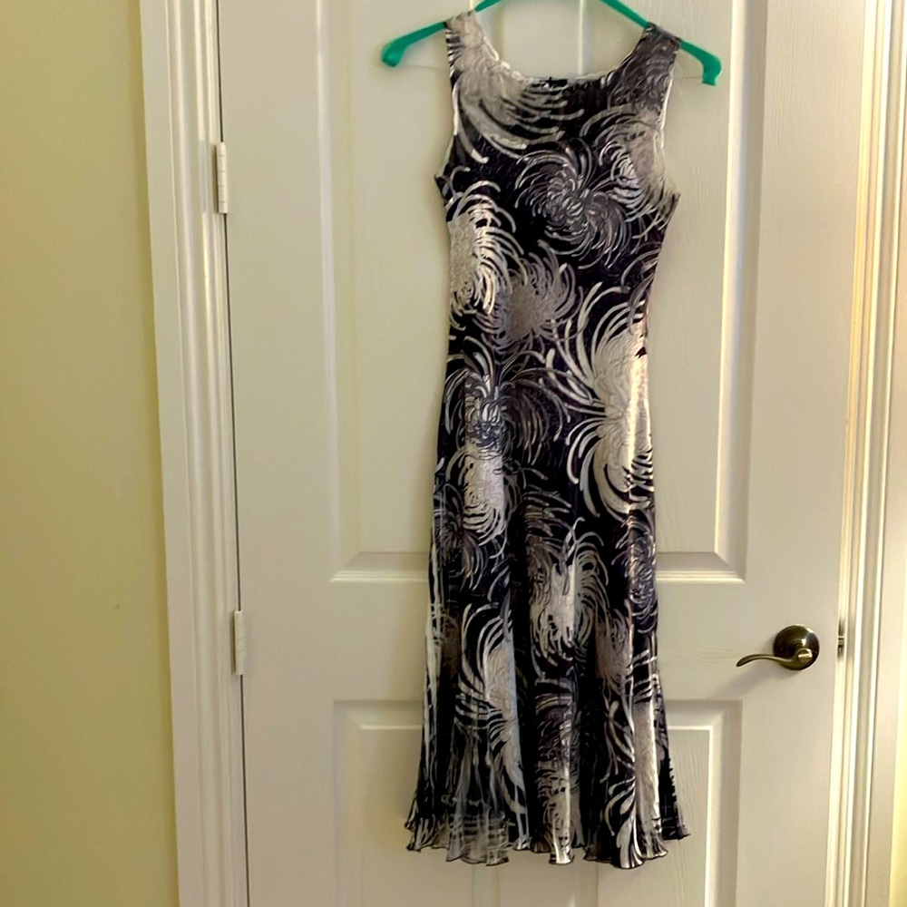 Komarov print dress with flared bottom.